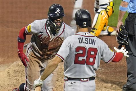 Acuña has 3 hits, Harris scores the winning run on a close call at the plate as Braves top Bucs 6-5